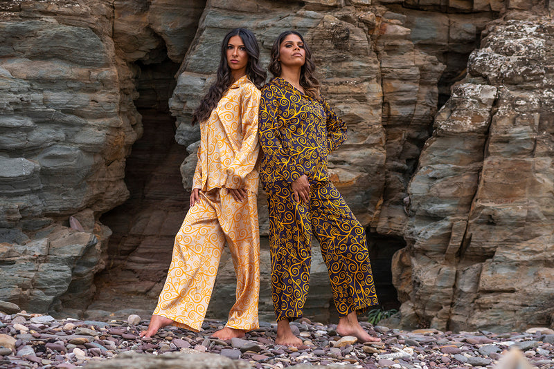 Gold swirls on Sand Colour Pyjamas and Gold Swirls on Aubergine coloured Pyjamas